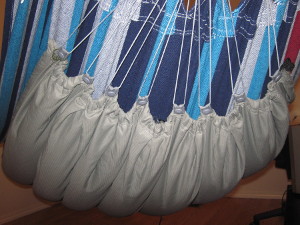 Close up view of clew underquilt when attached to hammock.
